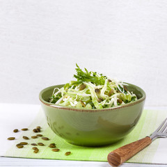 Cabbage Coleslaw with Pumpkin Seeds. Selective focus.