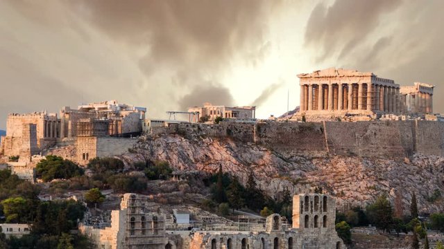 Parthenon temple on Athenian Acropolis, stormy weather, dramatic clouds , Athens, Greece - timelapse