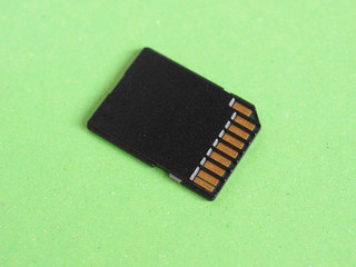 SD flash card over green