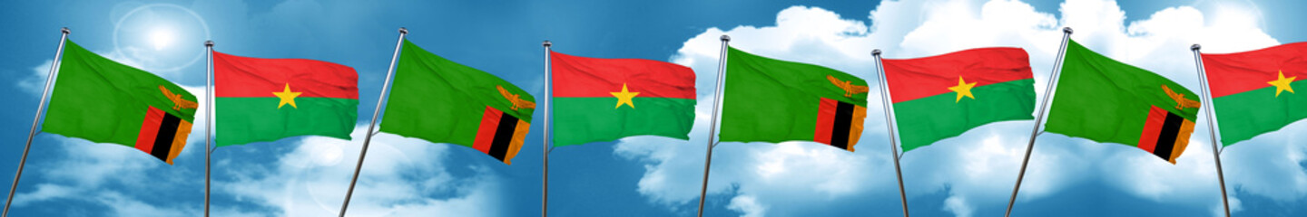 Zambia flag with Burkina Faso flag, 3D rendering