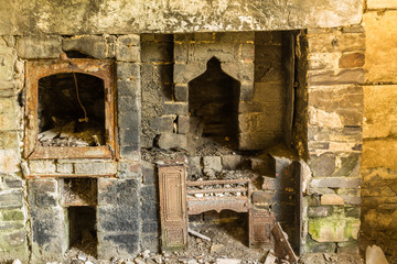 Derelict interior, fireplace