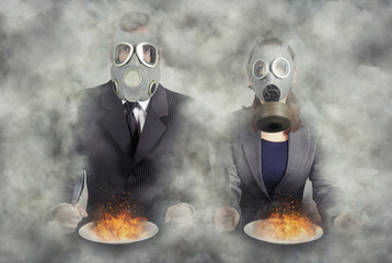 Apocalypse. A pair of gas masks at dinner, abstract vision.Photo