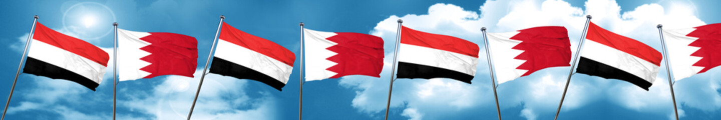 Yemen flag with Bahrain flag, 3D rendering
