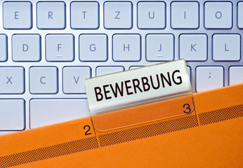 Bewerbung Ordner auf Computer Tastatur