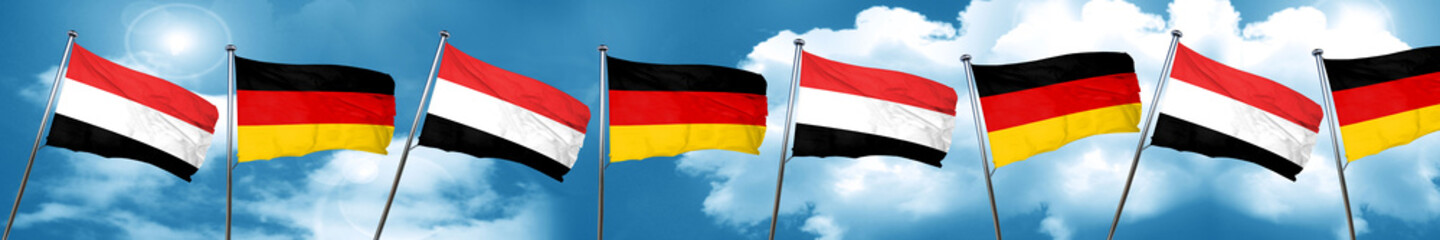 Yemen flag with Germany flag, 3D rendering