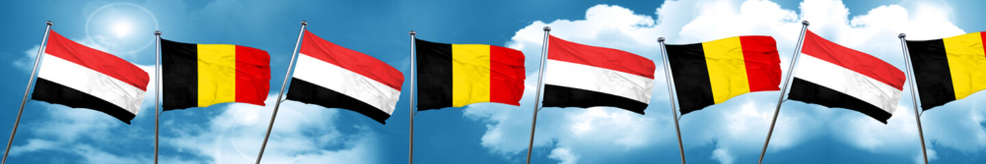 Yemen flag with Belgium flag, 3D rendering