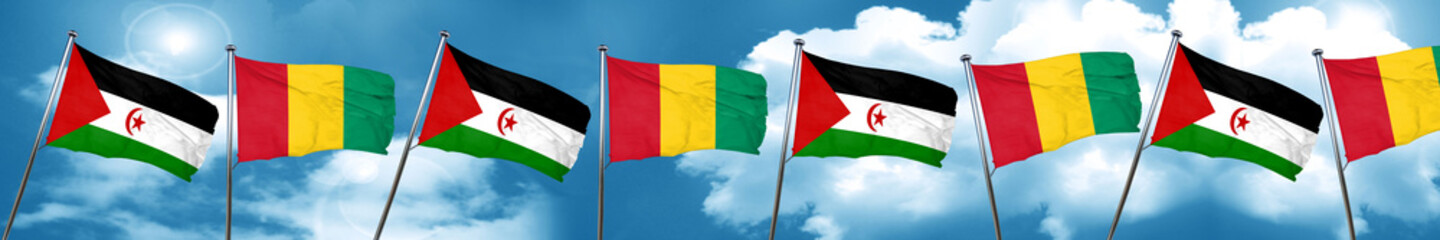Western sahara flag with Guinea flag, 3D rendering