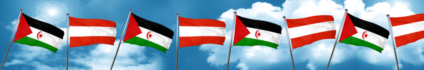 Fototapeta na wymiar Western sahara flag with Austria flag, 3D rendering