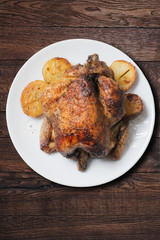 Chicken grill on wooden background