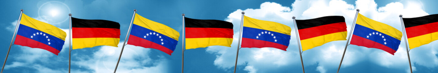 Fototapeta na wymiar Venezuela flag with Germany flag, 3D rendering