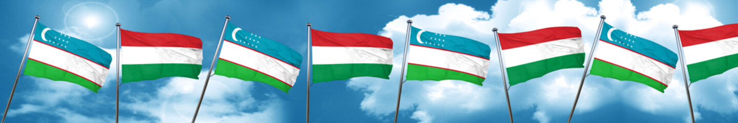 Uzbekistan flag with Hungary flag, 3D rendering