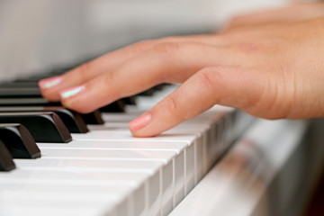 Fototapeta na wymiar Close-up piano, white and black keyboard