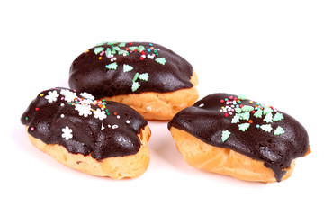 Three custard cookies with Christmas topping