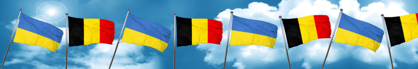Ukraine flag with Belgium flag, 3D rendering
