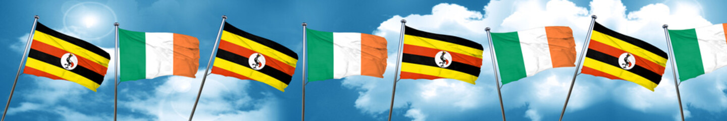Uganda flag with Ireland flag, 3D rendering