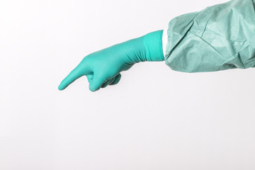 Surgeon hand is pointing with a finger