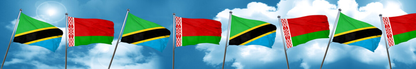 Tanzanian flag with Belarus flag, 3D rendering