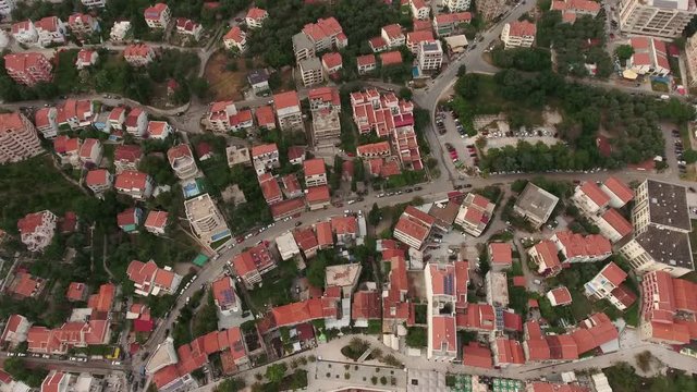 Top view of cityscape of Petrovac town, streets and roads in the center. Montenegro
