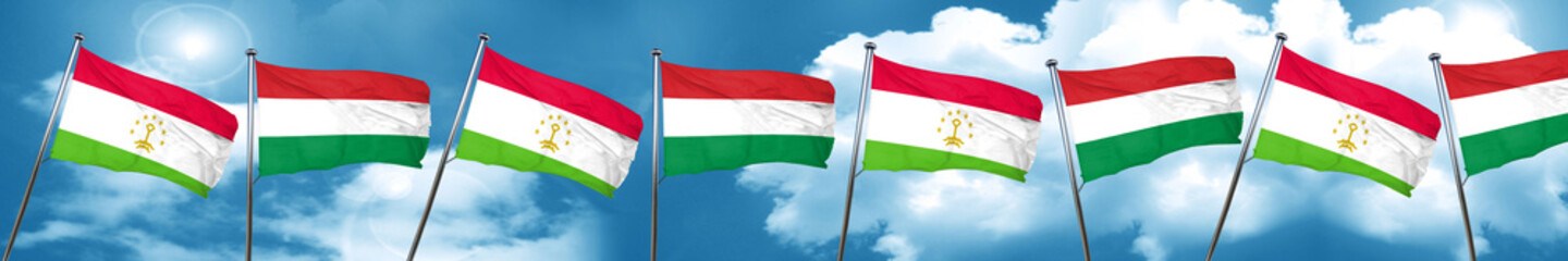 Tajikistan flag with Hungary flag, 3D rendering