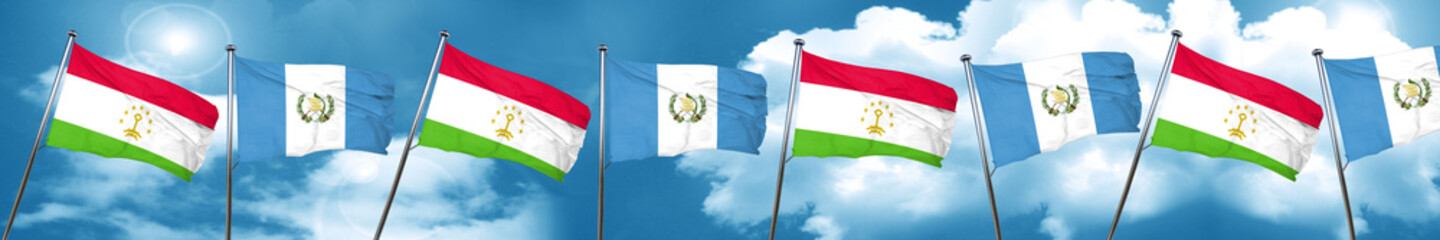 Tajikistan flag with Guatemala flag, 3D rendering
