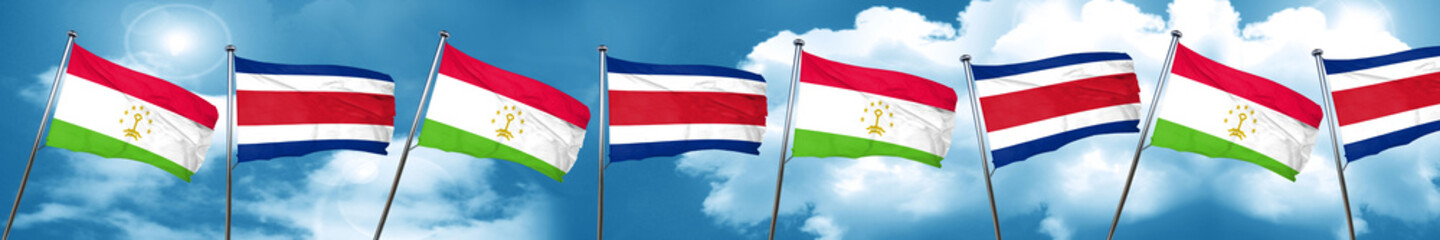 Tajikistan flag with Costa Rica flag, 3D rendering