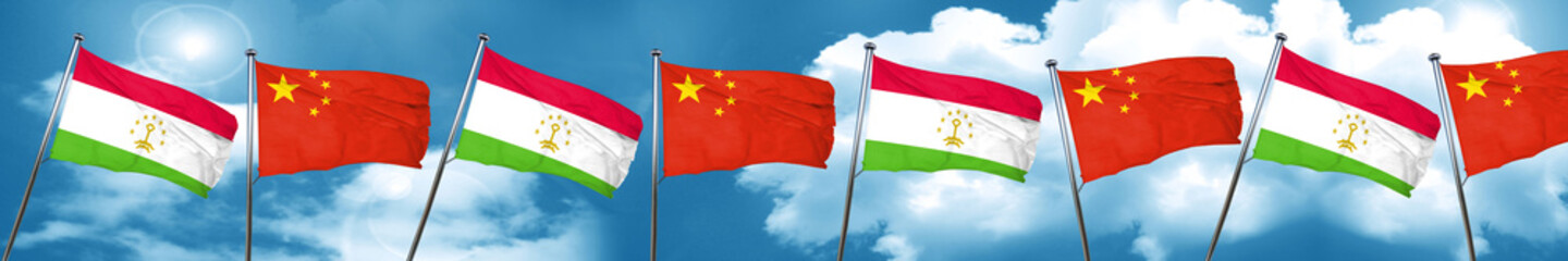 Fototapeta na wymiar Tajikistan flag with China flag, 3D rendering