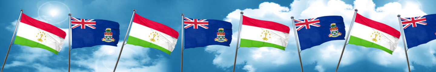 Tajikistan flag with Cayman islands flag, 3D rendering