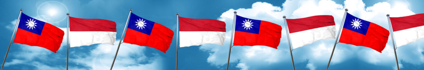 Naklejka na ściany i meble Taiwan flag with Indonesia flag, 3D rendering