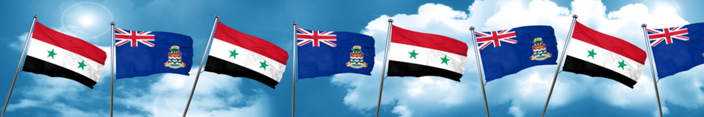 Syria flag with Cayman islands flag, 3D rendering