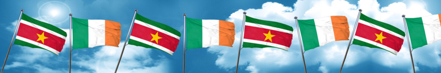 Suriname flag with Ireland flag, 3D rendering