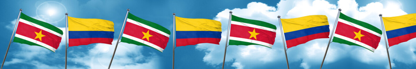 Fototapeta na wymiar Suriname flag with Colombia flag, 3D rendering