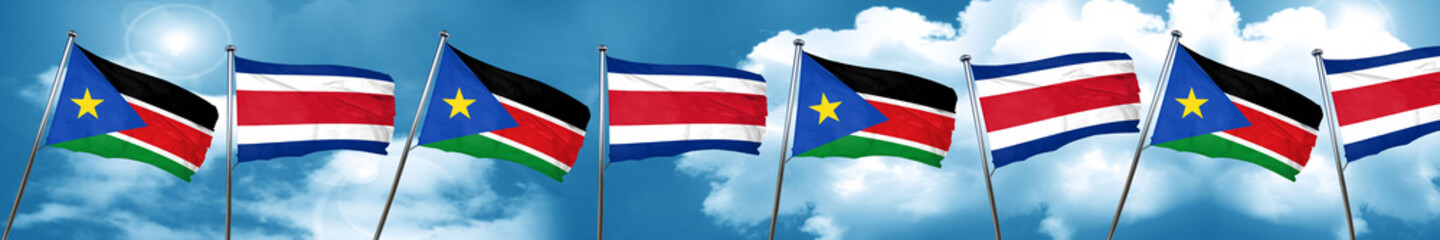 south sudan flag with Costa Rica flag, 3D rendering