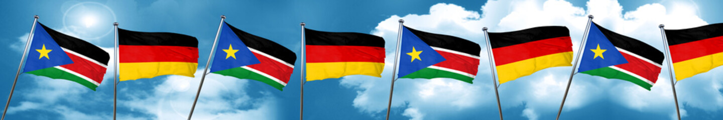 south sudan flag with Germany flag, 3D rendering