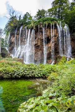 High waterfall in the forest. Plitvice, National Park, Croatia