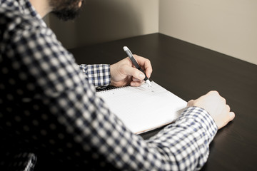 sitting and writing 