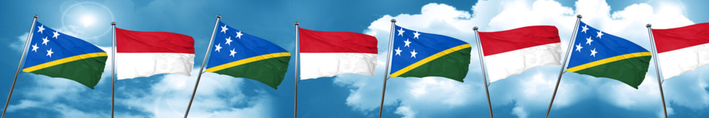 Solomon islands flag with Indonesia flag, 3D rendering
