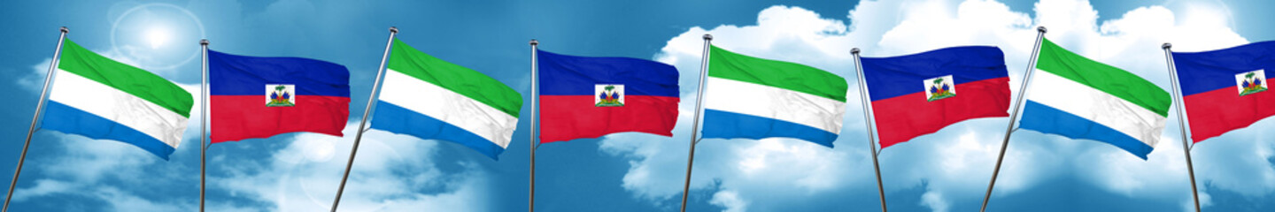 Sierra Leone flag with Haiti flag, 3D rendering