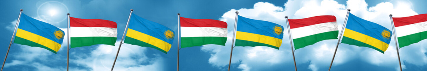 Fototapeta na wymiar Rwanda flag with Hungary flag, 3D rendering