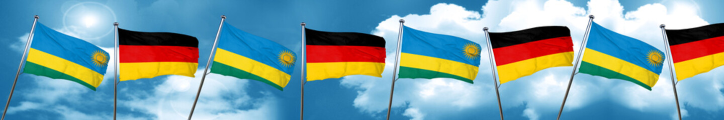 Rwanda flag with Germany flag, 3D rendering