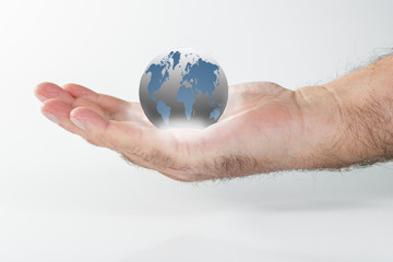 la terre/main tenant une boule lumineuse