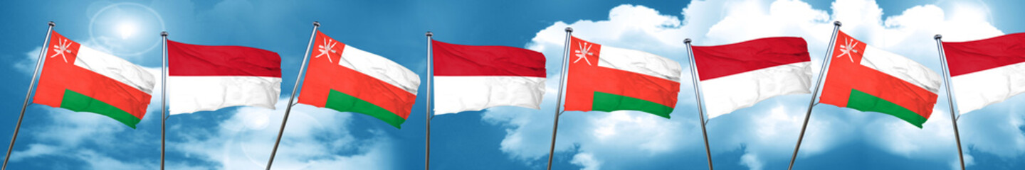 Oman flag with Indonesia flag, 3D rendering