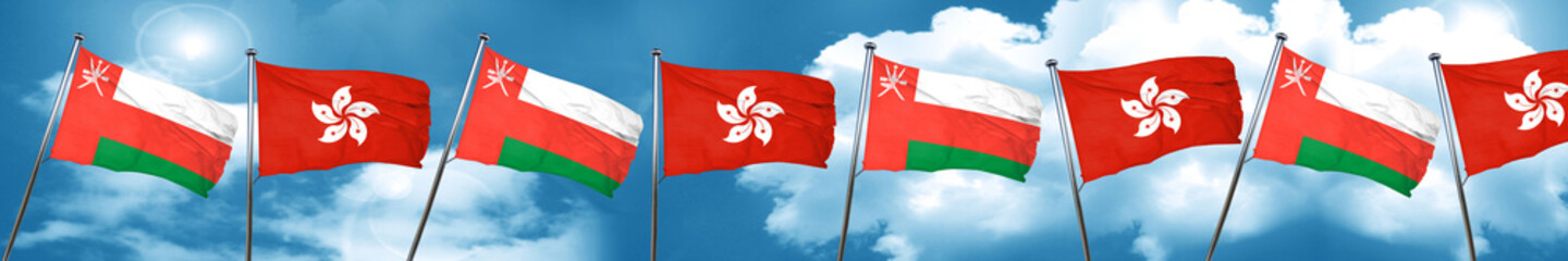 Fototapeta na wymiar Oman flag with Hong Kong flag, 3D rendering