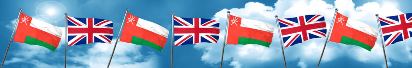 Oman flag with Great Britain flag, 3D rendering