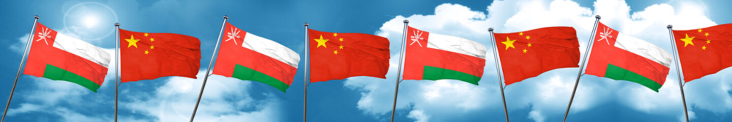 Oman flag with China flag, 3D rendering