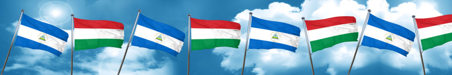 nicaragua flag with Hungary flag, 3D rendering