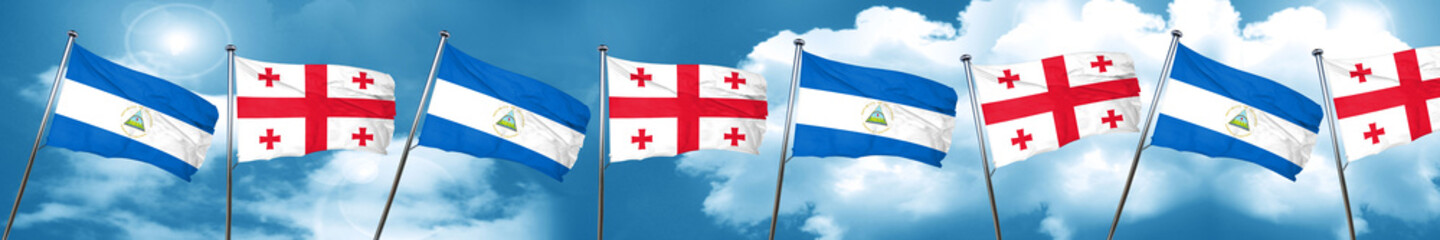 nicaragua flag with Georgia flag, 3D rendering