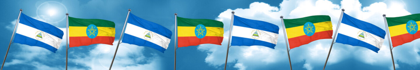 nicaragua flag with Ethiopia flag, 3D rendering