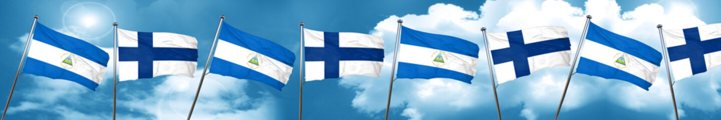 nicaragua flag with Finland flag, 3D rendering
