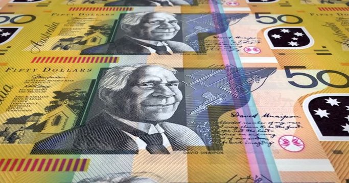 Series of banknotes of fifty australian dollars rolling on screen, coins of the world, cash money, loop