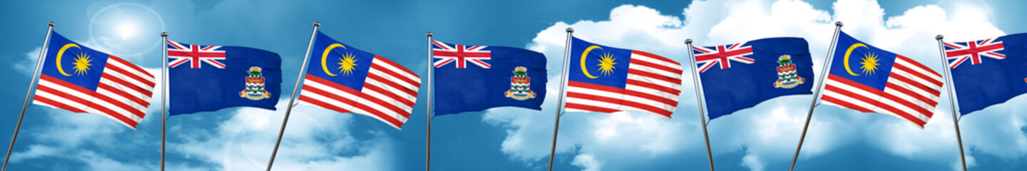 Malaysia flag with Cayman islands flag, 3D rendering